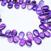 Natural Purple Amethyst Smooth Pear Drop Briolette Beads Strand Sold per 6 beads strand and Size 11mm to 13mm approx. Pronounced AM-eth-ist, this lovely stone comes in two color variations of Purple and Pink. This gemstones belongs to quartz family. All strands are hand picked. 